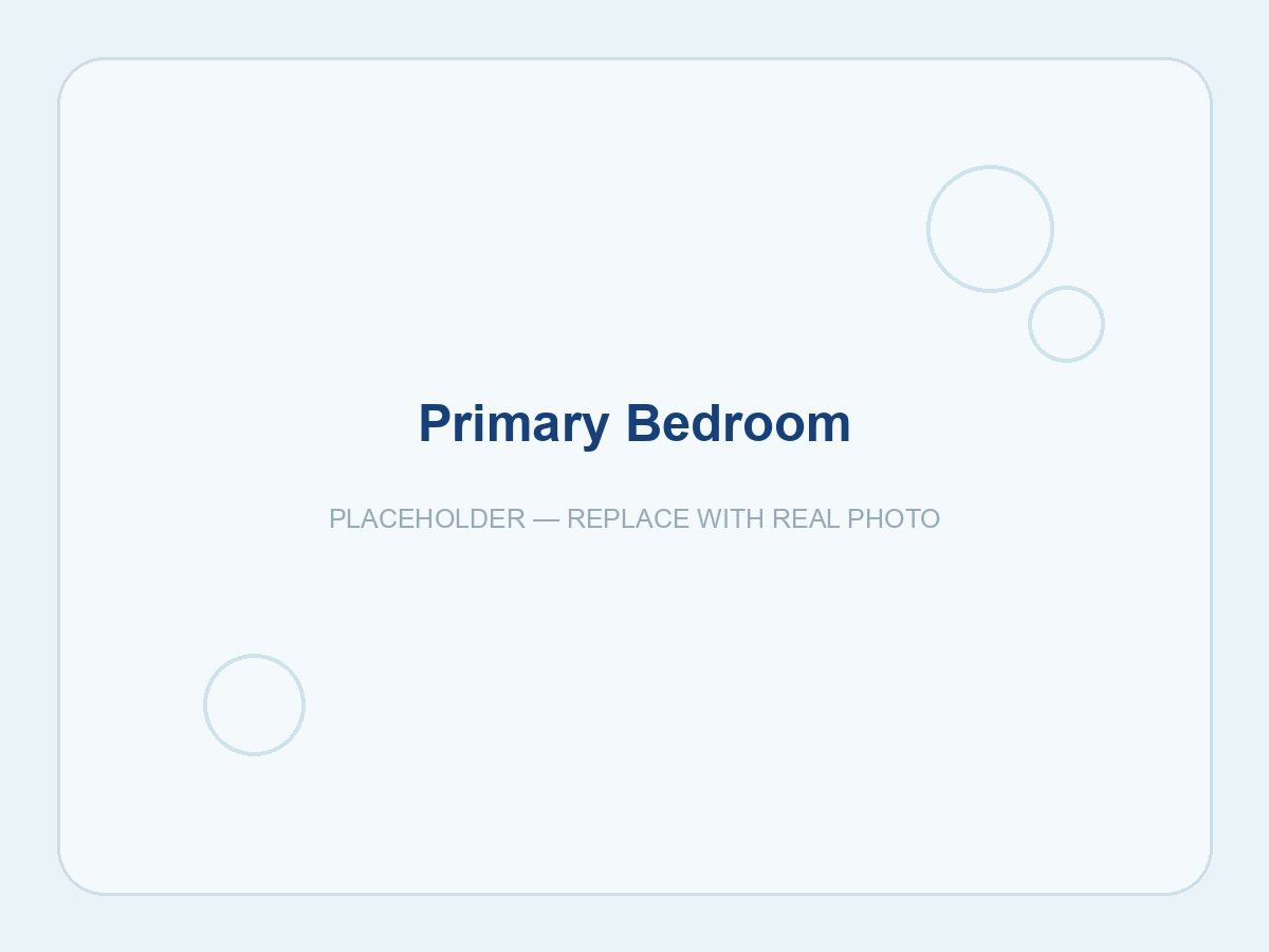 Made-up primary bedroom, freshly cleaned